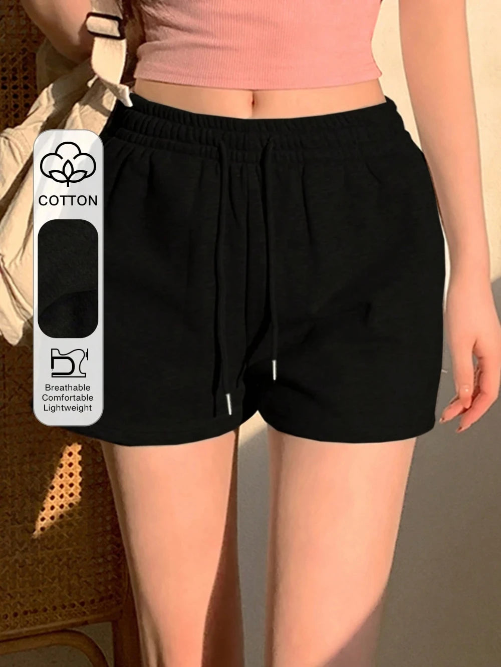 Women's solid color drawstring casual shorts, an ideal choice for everyday summer wear. Stylish loose-fitting athletic pants